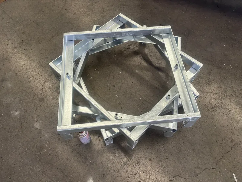 Framed trench grating with angle-iron frame set into the slab