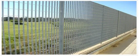 Long industrial perimeter grating fence installation