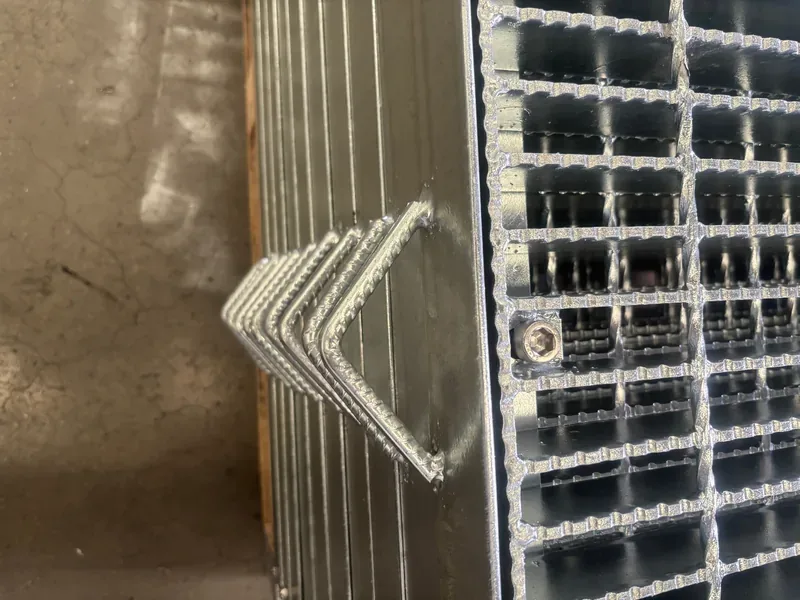 Sump pit grating cover over a collection pit