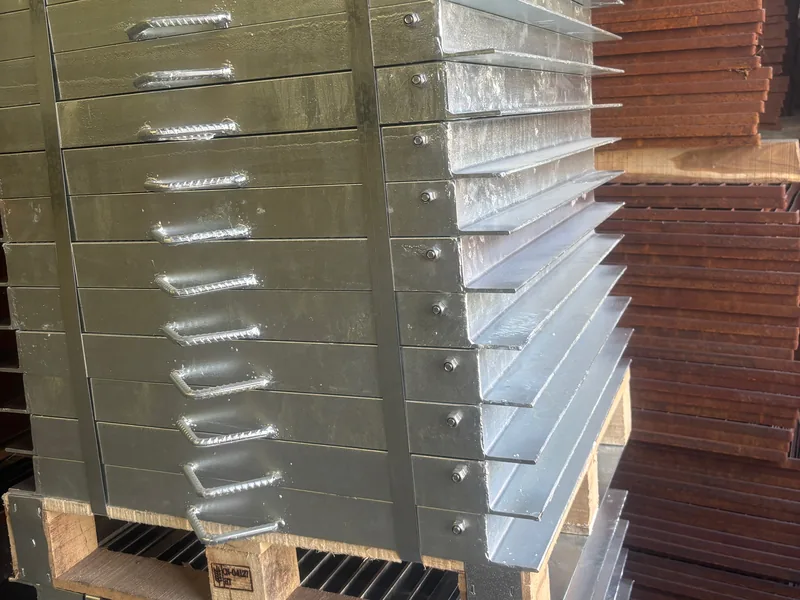 Trench drain grate in a loaded area showing the load it carries
